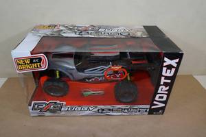 lot 112 image: NEW New Bright Vortex Remote Control Buggy