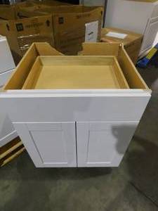 lot 16 image: Hampton Bay Shaker Satin White Stock Assembled Kitchen Cabinet Lot of 4