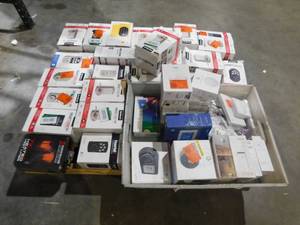 lot 32 image: ASSORTED LOT OF DOOR LOCKS AND SMART THERMOSTATS.