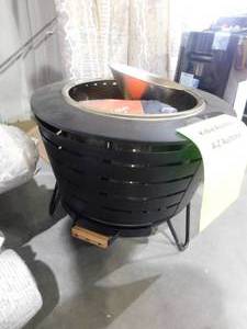lot 33 image: TIKI 25 in. Black Metal Patio Fire Pit