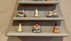lot 92 image: Lighthouse Shaped Display Shelf with Lighthouse Figurines