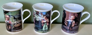 lot 173 image: 12 Hummel Month of the Year Mugs