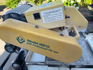 lot 212 image: Qep 2 Horsepower Professional Tile Saw Model 6001D
