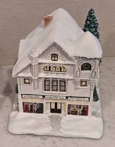 lot 198 image: Pair of Norman Rockwell Hawthorn Christmas Villages