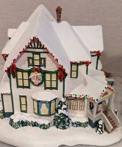 lot 202 image: Pair of Norman Rockwell Hawthorn Christmas Villages