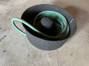 lot 99 image: Decorative Garden Hose Holder