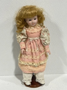 lot 2 image: Porcelain Doll with Stand