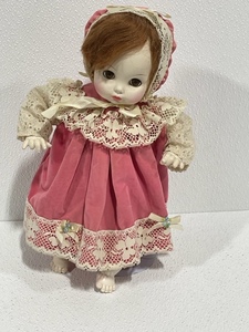 lot 6 image: Vintage Doll with Stand