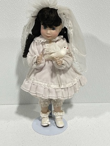 lot 8 image: Porcelain Doll with Stand