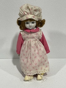 lot 16 image: Porcelain Wind Up Music Doll with Stand