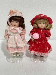 lot 23 image: 2 Porcelain Dolls with Stands