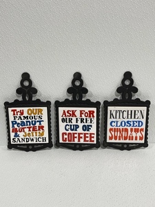 lot 27 image: Vintage Cast Iron and Ceramic Trivets