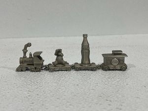 lot 35 image: Vintage Collectible Coke Pewter Train