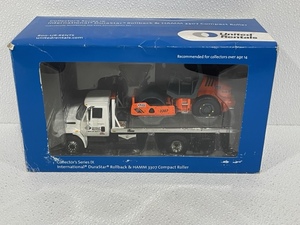 lot 123 image: United Rental Model Truck and Roller