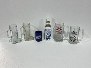 lot 128 image: Saki Bottle, Glass Boots, Beer Mugs