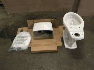 2-piece 1.0 GPF1.28 GPF High Efficiency Dual Flush Elongated Toilet in Biscuit by Glacier Bay Customer Return See Terms on Auction