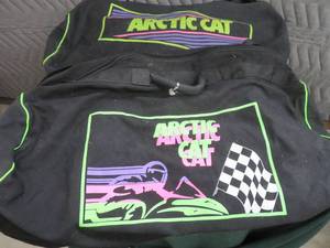 2 LARGE ARTIC CAT DUFFAL BAGS WITH GOODIES INSIDE