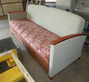 lot 20 image: Couch with drawers underneath, back folds down to use as a bed - 78 inches long