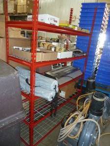 lot 25 image: Red garage shelving unit