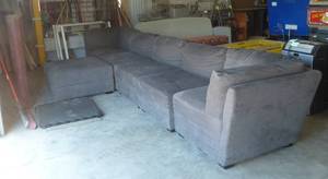 lot 46 image: Large sectional couch, 2 end pieces are 37x37 inches, the 3 middle pieces are 33x37, plus the footstool piece 37x37