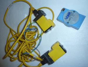 lot 75 image: Two Banner Q45BW22LPQ photoelectronic sensors and an ADAM data module