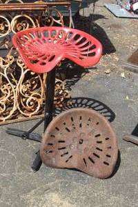 lot 315 image: Vintage Cast Iron Tractor Seat Stool with Extra Tractor Seat