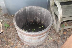 lot 395 image: Whiskey Barrel Flower Pot 25