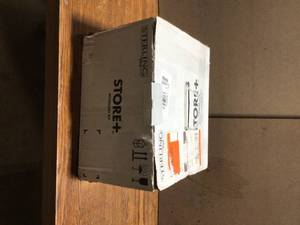 lot 3 image: Store Family 12-Piece Shelf Kit in White by Sterling Customer Returns See Terms on Auction