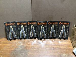 lot 14 image: Lot of 6 Gerber Suspension NXT 15-N-1 Multi-Tool with Pocket Clip Customer Returns See Terms on Auction
