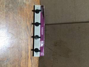lot 55 image: Rustic 18 in. L Gray and Black Post Hook Rail by Home Decorators Collection Customer Returns See Terms on Auction