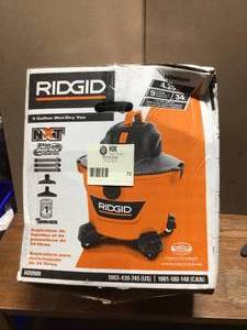 lot 72 image: 9 Gal. 4.25-Peak HP NXT WetDry Shop Vacuum with Filter, Hose and Accessories by RIDGID Customer Returns See Terms on Auction