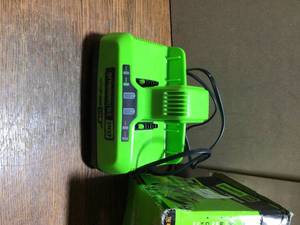 lot 79 image: PRO 60V Dual Port Turbo Charger by Greenworks Customer Returns See Terms on Auction