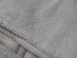 lot 33 image: Life Comfort Eco Plush Throw Ivory 60x70