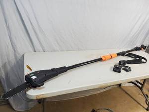 lot 15 image: New Scotts Cordless Lithium Ion Pole Saw Chain Saw