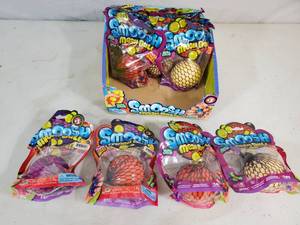 lot 133 image: New Case of 12 Smoosh Ball Toys