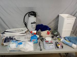 lot 142 image: New and Used Windex, Towels, Household, Toilet Seats, Trash Bin, Etc