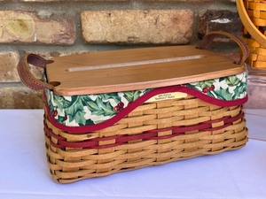 Variety of Four Longaberger Christmas Baskets including a Longaberger 2002 Traditions Basket