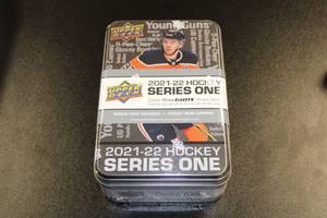 lot 63 image: 2021-22 Upper Deck Series 1 Hockey Tin Sleeve  6 Factory Sealed Tins
