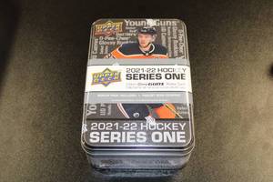 lot 62 image: 2021-22 Upper Deck Series 1 Hockey Tin Sleeve  6 Factory Sealed Tins