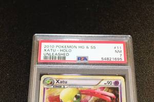 lot 125 image: 2010 Pokemon HG & SS Xatu Holo Unleashed #1195 PSA 7