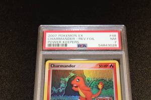 lot 126 image: 2007 Pokemon EX Power Keepers Reverse Foil Charmander #48108 PSA 7