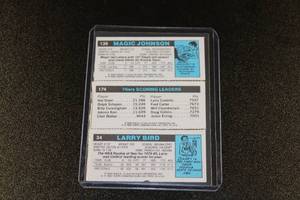 lot 133 image: 1980-81 Topps Magic Johnson (Rookie Card) Larry Bird Julius Erving #139 Seperated