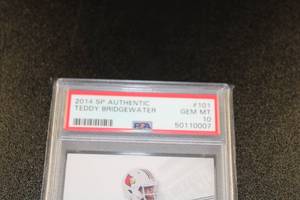 lot 221 image: 2014 SP Authentic Teddy Bridgewater #101 Rookie Card PSA 10