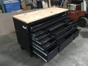 61 in. W x 23 in. D Heavy Duty 15-Drawer Mobile Workbench Tool Chest with Solid Wood Top in Matte Black by Husky Customer Returns See Terms on Auction