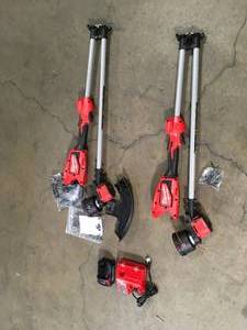 Lot of 2 VMilwaukee M18 18V Lithium-Ion Brushless Cordless String Trimmer Kit with 6.0 Ah Battery and Charger Customer Returns See Terms on Auction