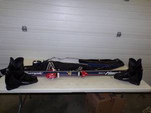 Down Hill Skis with 8.5 Boots, Poles and cases