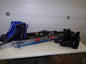 Down Hill Skis with 13.5 Boots, Poles and cases