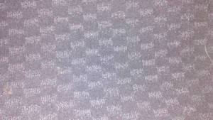 lot 385 image: 12 ft. Roll Of Carpet Commercial Low Loop - charcoal with flecks of color.