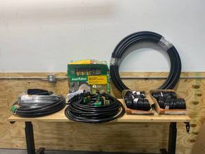lot 2 image: RAIN BIRD Automatic Sprinkler System with Tubing
