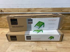 lot 74 image: LIVING ACCENTS Lot of 2- Green Wood Ottomans
